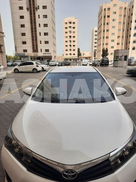 Toyota corolla 2015.1.6.100% orgnel paint gained Gcc