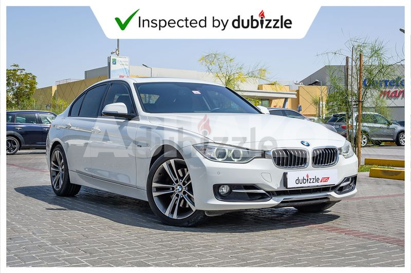 AED1394/month | 2014 BMW 328i 2.0L | Full Service History | GCC Specs